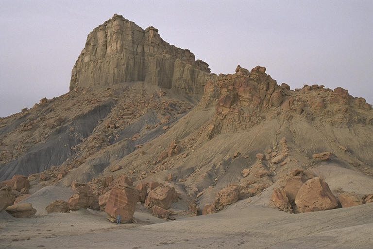 Mark dwarfed by huge boulders